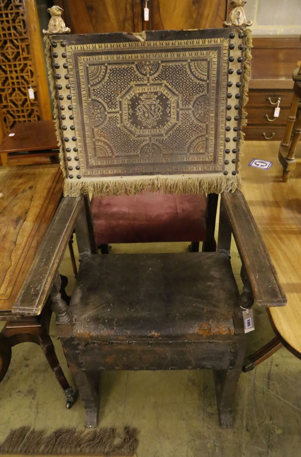 Two carved walnut Italian Renaissance style open armchairs,